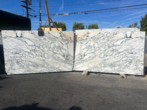 Arabascato Corchhia – Classic white marble with intricate gray veining and swirling patterns; ideal for statement countertops.