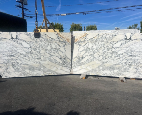 Arabascato Corchhia – Classic white marble with intricate gray veining and swirling patterns; ideal for statement countertops.