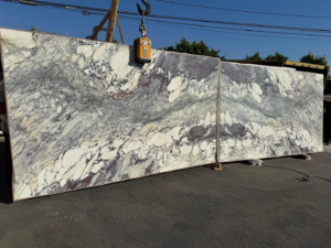 Calacatta Capraia – White marble with bold gray and taupe veining, known for its high contrast and dynamic movement.