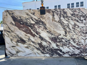 Calacatta Viola Honed – Matte-finished marble with deep purple veining and natural texture; bold yet refined.