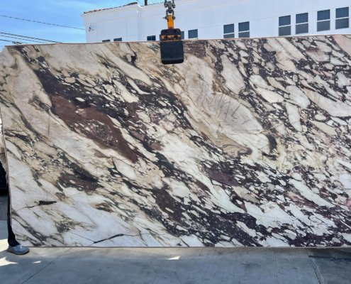 Calacatta Viola Honed – Matte-finished marble with deep purple veining and natural texture; bold yet refined.