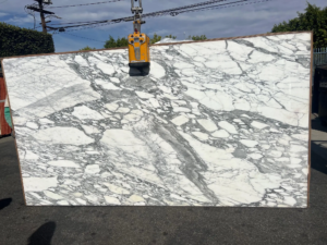 Calacatta Caldia – Pale white marble with subtle gold and gray veins; sophisticated and serene appearance.