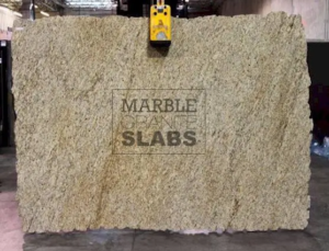 Giallo Ornamental Granite Slab – light golden granite with beige and gray speckles