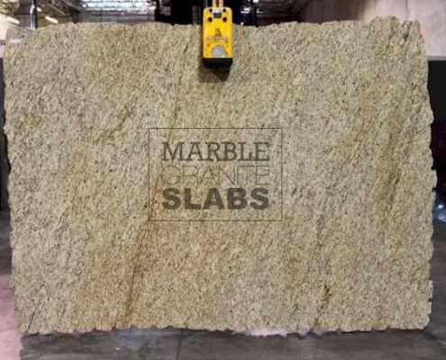 Giallo Ornamental Granite Slab – light golden granite with beige and gray speckles