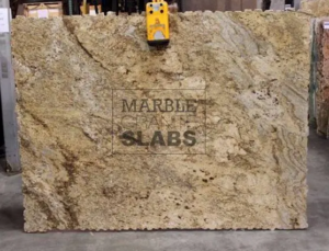 Giallo Rio Granite Slab – golden granite with dark brown mineral accents