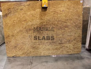 Madura Gold Granite Slab – warm golden granite with black and gray accents