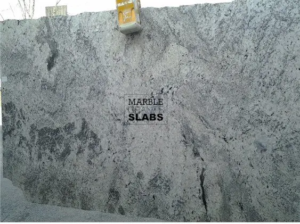 Mist Green Granite Slab – muted green granite with gray undertones