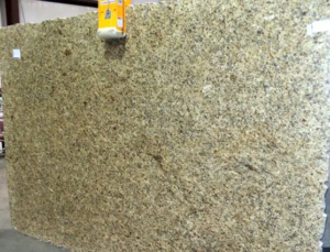 New Venetian Gold Granite Slab – golden granite with dark brown and gray specks