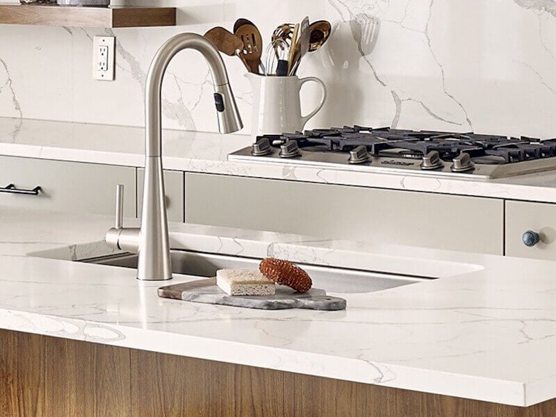 Calacatta Gold quartz kitchen countertop fabrication & installation.