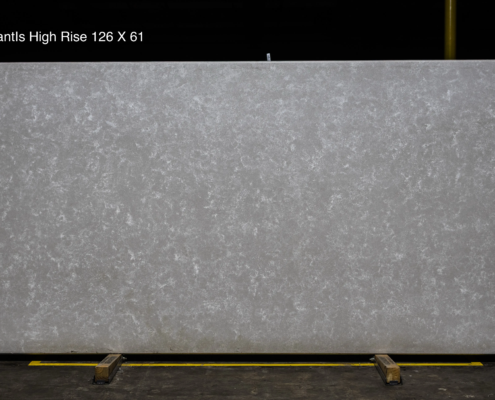 126 x 61 slab. Soft light gray quartz with elegant movement for upscale modern countertop projects.