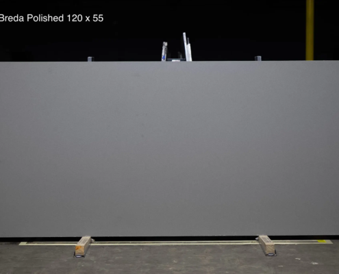 120 x 55 slab. Solid medium-dark gray quartz with a sleek polished finish for bold modern spaces.