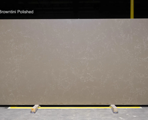 Warm taupe quartz with delicate light veining for elegant kitchens, vanities, and accent countertops.