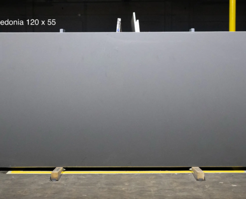120 x 55 slab. Deep charcoal quartz for dramatic islands, contemporary kitchens, and modern commercial work.