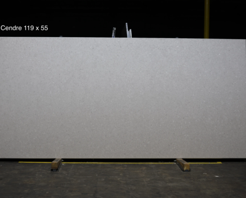 119 x 55 slab. Soft light gray quartz with subtle fine detail for calm, neutral kitchen spaces.
