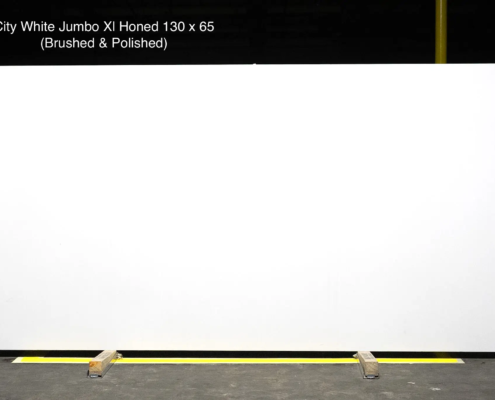 130 x 65 slab. Bright white quartz available in honed, brushed, or polished looks for sharp modern designs.