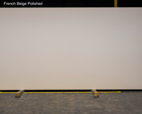 Soft beige quartz with a clean polished finish for warm, neutral kitchens, vanities, and modern interior spaces.