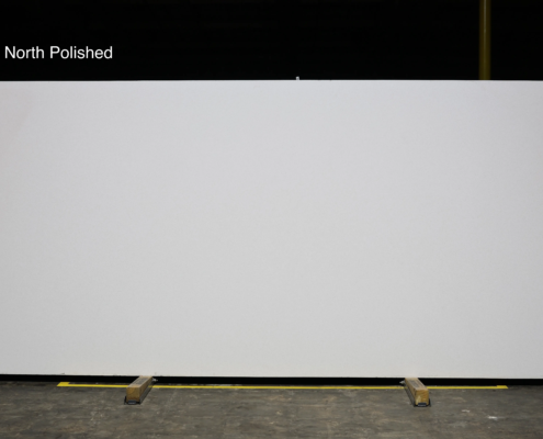 Bright white polished quartz for clean modern kitchens, bathroom countertops, and minimalist interior styles.