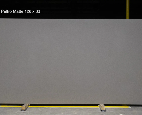126 x 63 slab. Medium gray matte quartz for modern cabinetry, sleek islands, and understated contemporary spaces.