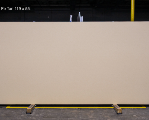 119 x 55 slab. Warm solid tan quartz for earthy kitchens, bathroom vanities, and seamless neutral interiors.
