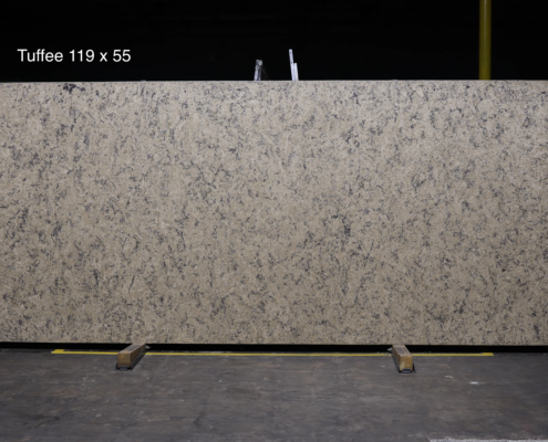 119 x 55 slab. Warm beige quartz with natural movement for inviting kitchens and timeless neutral countertop designs.