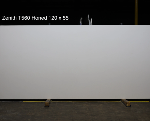 120 x 55 slab. Smooth honed white quartz for minimalist kitchens, bath vanities, and understated modern design.
