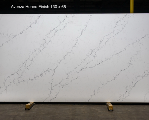 130 x 65 slab. White quartz with strong gray veining in a honed finish for a high-end custom look.