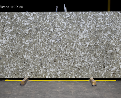 119 x 55 slab. Patterned earth-tone quartz with a natural layered look for warm kitchen designs.