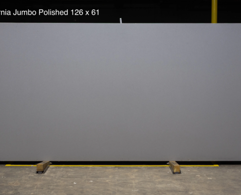 126 x 61 slab. Smooth light gray quartz with a refined polished finish for a clean seamless feel.