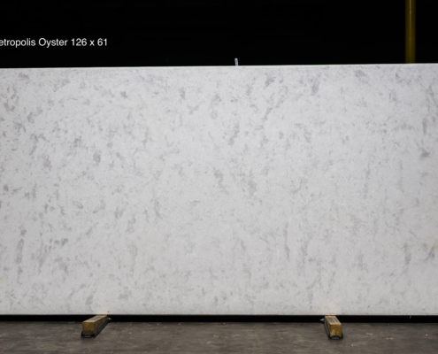 126 x 61 slab. Light quartz with soft cloud-like movement for bright kitchens and clean transitional interiors.